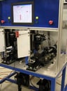 Custom designed mechanical test stand for hydraulic door closer with a custom software interface with PLC control. 