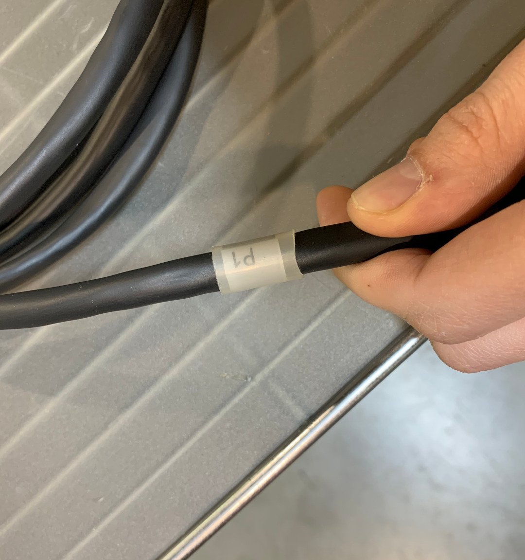 Close up aerospace grade assembly cable valve